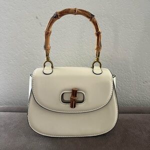 Elegant Cream Handbag with Bamboo Handle